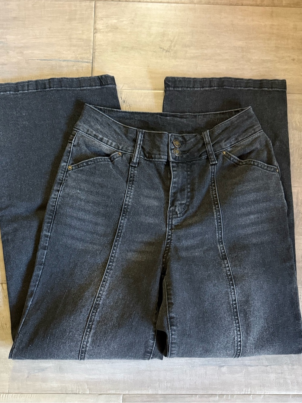 High-Rise Black Flare Jeans with Front Panel Seams